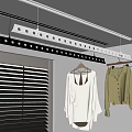 Indoor Clothes Hanging Space With Window Blinds White Top and Brown Shirt