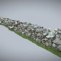 Natural Stacked Stone Wall With Green Grass Base In Outdoor Landscape