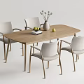 Wooden Dining Table Set With Four Light Gray Armchairs Vase Flowers Books And Fruits