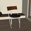 Modern Single Chair With Wooden Backrest Black Seat And Metal Legs In Minimalist Interior
