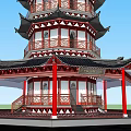 Traditional Chinese Multi Story Pagoda With Red Columns Black Roof Against Blue Sky Green Ground
