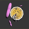Yellow Cream Dessert in Green Cup with Cartoon Characters and Pink Hearts
