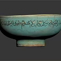 Turquoise Decorative Bowl With Gold Trim Intricate Patterns And Text Inscriptions