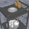 Mobile Two Tier Black Metal Side Table With Food Tray And Tea Set
