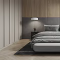 Modern Bedroom Interior With Wooden Accent Wall Gray Upholstered Headboard Table Lamps And Armchair
