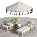 Outdoor Lounge Chairs with Decorative Pillows Umbrella and Side Table Setup 3d model