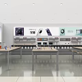 Modern Mall Electronics Store With Large Screen Displays Product Shelves And Tables