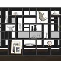 Modern Black Bookcase with Decorative Items Frames Books and Green Plants 3d model