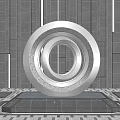 Modern Metallic Spherical Sculpture With Circular Ring Design On Stone Floor Against Gray Wall