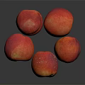 Fresh Red Peaches in a Pile on Dark Background with Shiny Skin