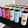 Colorful Assorted Canned BIO Beverages with Various Flavors on Table in Natural Light