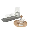 Transparent Glass Cups In Various Shapes Square And Round On Wooden Tray And Stone Slab