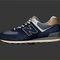 Blue Sneakers With White Laces Orange Accents Mesh Upper Leather Details And Brown Sole