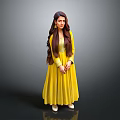 A Woman in Yellow Flowy Dress with Long Hair and Earrings Standing Against Gray Background