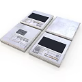 Three Silver Electronic Control Panel Devices With Screens And Buttons