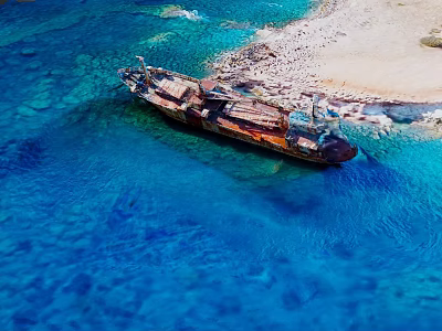 Rusty Shipwreck In Clear Blue Sea Near Shallow Water And Beach 3d model
