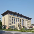 Beige Multi Storey Office Building With Modern Design Surrounding Greenery And Pedestrians