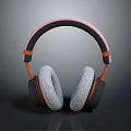 Modern Headphones With Gray Ear Cushions Pink Black Headband And Orange Accents
