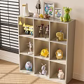 Toy Storage Cabinet With Multi Tiered Grid Shelf Holding Various Toy Figures And Decorative Ornaments