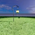 Outdoor Lantern With Yellow Diamond Pattern And Black Curved Metal Stand On Green Grass