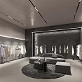 Modern Clothing Store Interior With Apparel On Display Racks And Seating Area