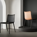 Stylish Modern Dining Chairs Black And Orange In Minimalist Interior Setting