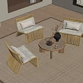 Three Rattan Leisure Chairs With Cushions On Indoor Rug Near Coffee Table