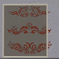 Intricate Traditional Ornamental Sculpture Carvings With Orange Decorative Patterns And Artistic Design