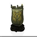 Ancient Decorative Shield Weapon With Golden Winged Creature Design And Black Wooden Base