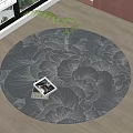 Round Area Rug With Floral Pattern On Wooden Floor Featuring Potted Plant And Magazine