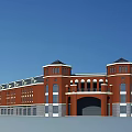 Red Brick Commercial Street With Classical Towers Arched Entrance And Multiple Windows