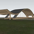 Modern Curved Landscape Bridge in Park With Green Grass Trees and Water View