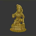 Golden Ornate Sitting Sculpture With Intricate Details And Colorful Decorative Base