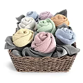 Decorative Green Towels Shaped As Roses In Wicker Basket With Aromatherapy Accessories