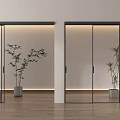 Glass Sliding Doors with Black Frames Indoor Plants White Walls Wooden Floor Ambient Lighting