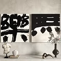 Black And White Calligraphy Artworks On Wall With Sculpture Vases And Decorations