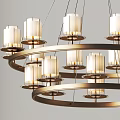 Multi Tiered Chandelier With Candle Shaped Lights And Brass Metal Frame Hanging In Minimalist Interior