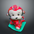 Red Monkey Plush Toy With Colorful Pattern And White Face On Green Mat