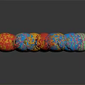 Decorative Ornament Set With Colorful Foil Wrapped Shiny Multi Colored Easter Eggs On Black Background