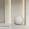 White Decorative Sphere in Light Colored Indoor Space with Soft Lighting Effects