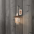 Modern Wall Sconce with Metallic Body and Textured Glass Shade on Dark Wooden Wall
