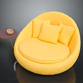 Modern Yellow Round Lounge Chair with Soft Cushions and Small Round Side Table with Bowl