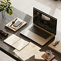 Modern Laptop Workspace Setup With Green Plant Mobile Phone Notebooks And Pens