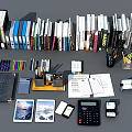 Organized Books And Magazines Display With Office Stationery Calendars Calculators And Framed