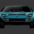 Blue Vintage Sports Car With Sleek Body And Distinct Front Grille
