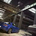 Blue Sports Car Exterior In Industrial Warehouse With Metal Beams And Large Windows