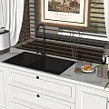 Modern Kitchen With Black Sink White Cabinets Faucet Countertop Rice Cooker Fruit Plate Spice Bottles