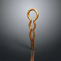 Golden Metal Hair Accessory With Curved Design For Styling Hair