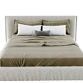 Modern Double Bed With Upholstered Headboard Beige Sheets And White Pillows