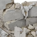 Rubble Pile With Gray Bricks Scattered Small Stones And Blue Green Debris